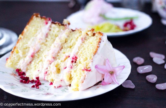 Lemon and Raspberry Naked Layer Cake recipe One Perfect Mess easy baking lemon cake raspberry cream cheese frosting raspberries from scratch fresh flowers rustic dessert 7